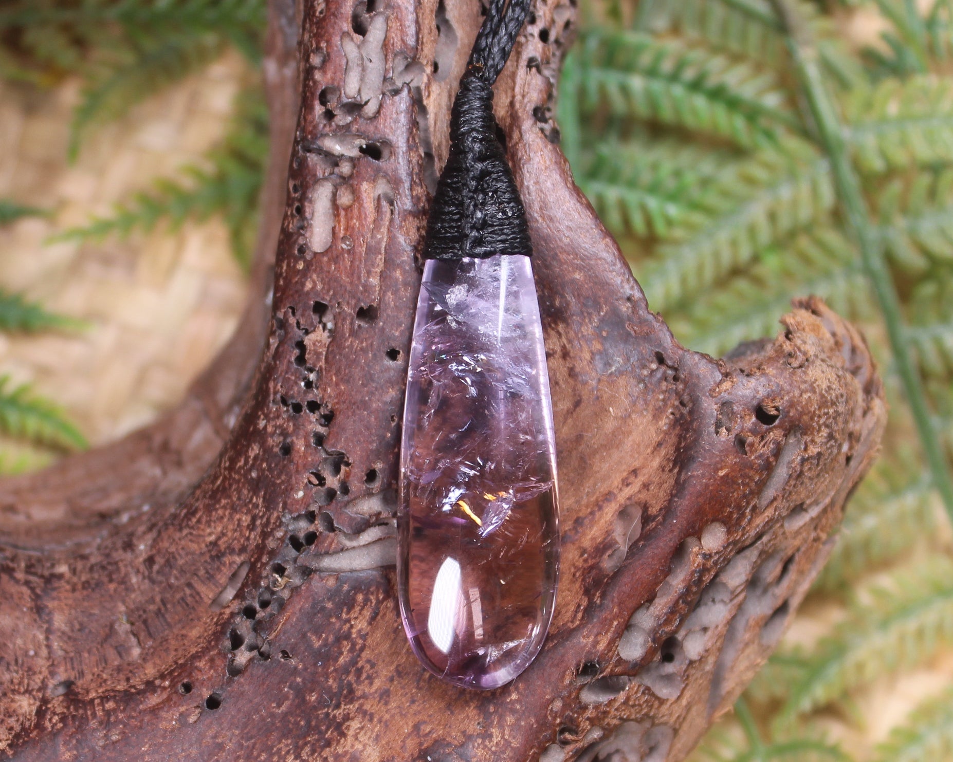 Roimata pendant carved from Amethyst