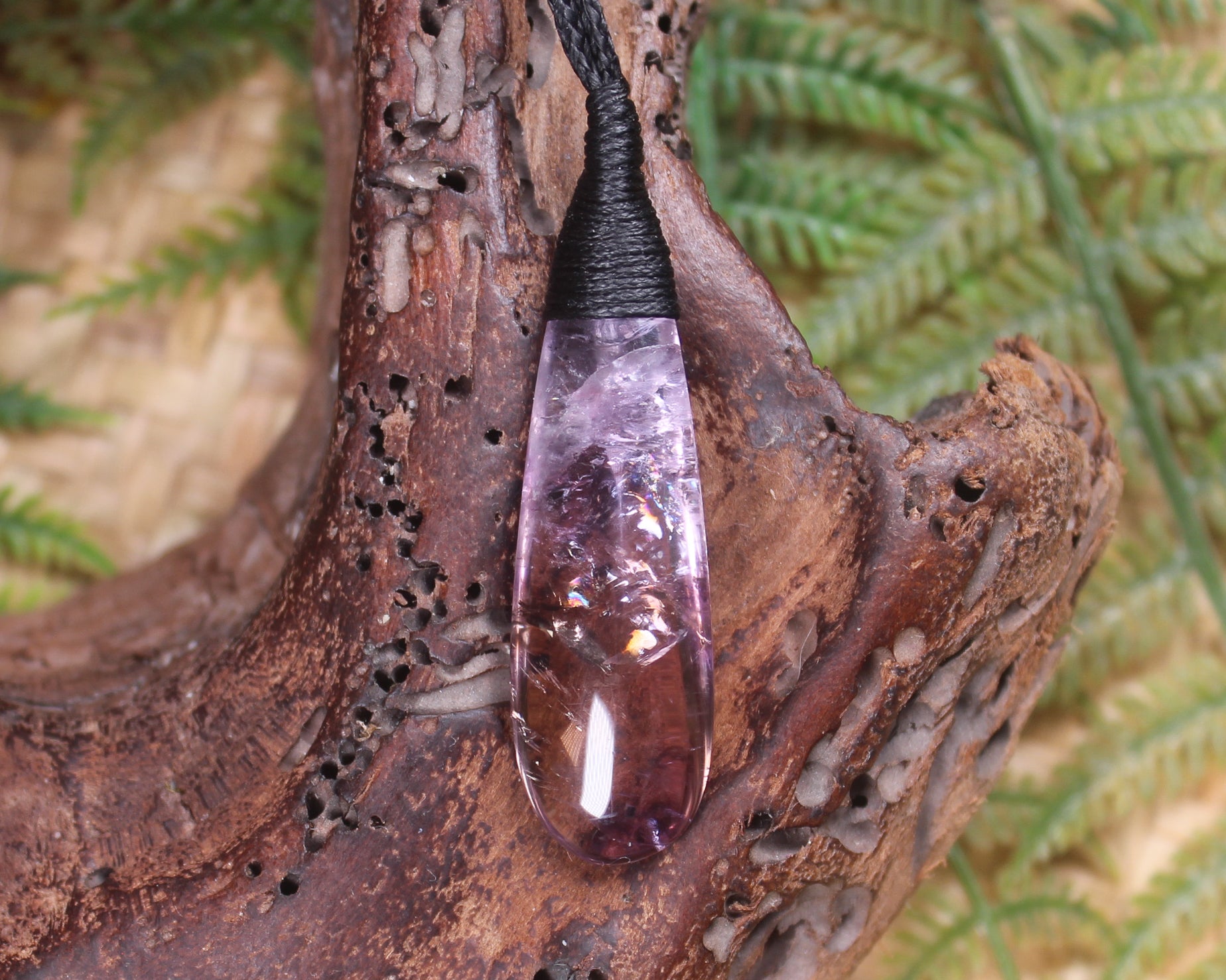 Roimata pendant carved from Amethyst