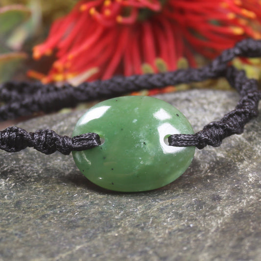 Adjustable cord bracelet with Kawakawa Pounamu