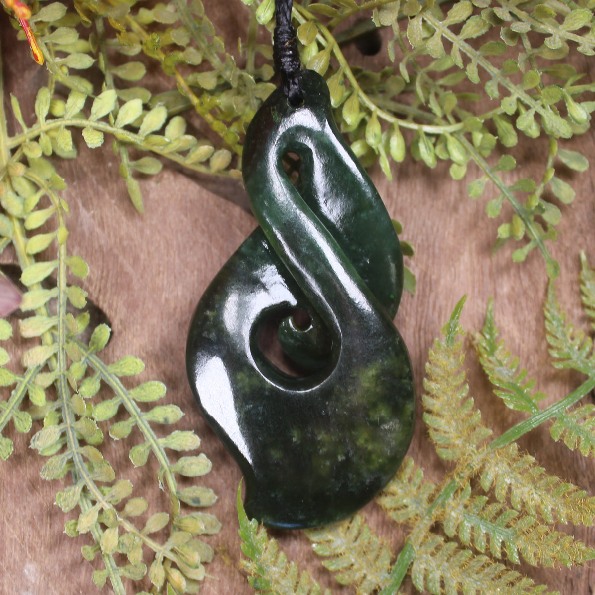 Koru Twist carved from Kawakawa Pounamu - NZ Greenstone