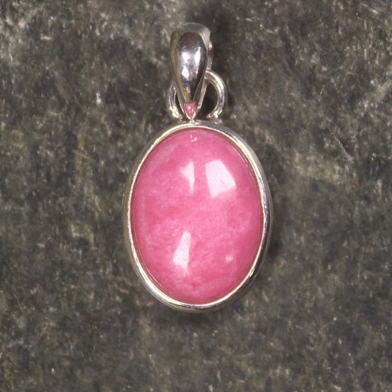 Sterling Silver Pendant carved from Rhodonite
