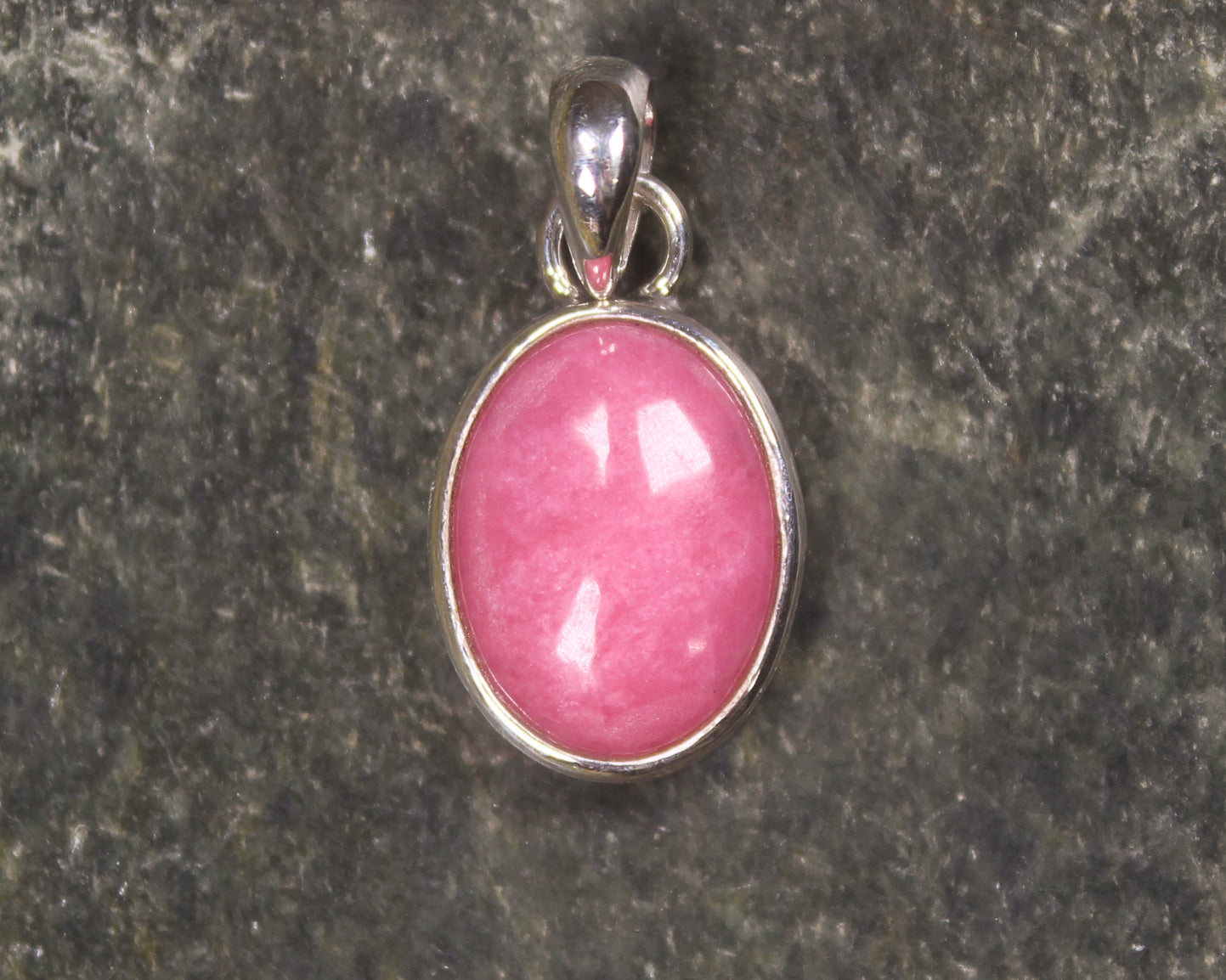 Sterling Silver Pendant carved from Rhodonite