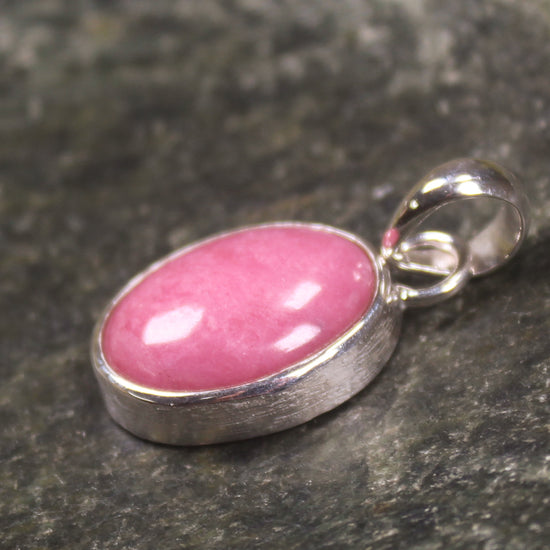 Sterling Silver Pendant carved from Rhodonite