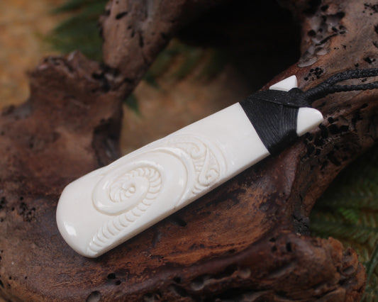 Toki or Adze with Koru carved from Beef Bone