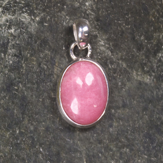 Sterling Silver Pendant carved from Rhodonite