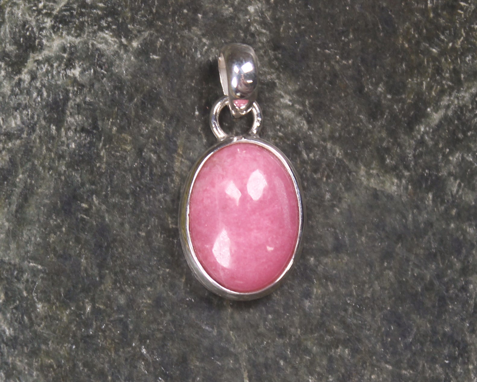 Sterling Silver Pendant carved from Rhodonite