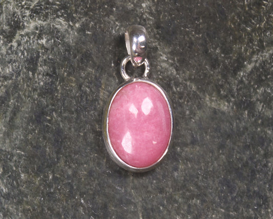 Sterling Silver Pendant carved from Rhodonite