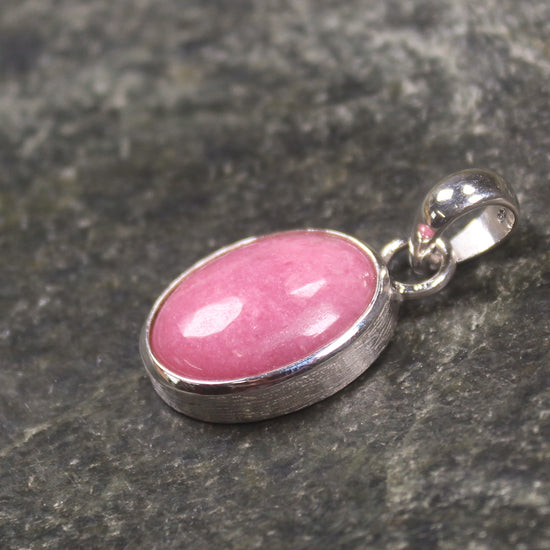 Sterling Silver Pendant carved from Rhodonite