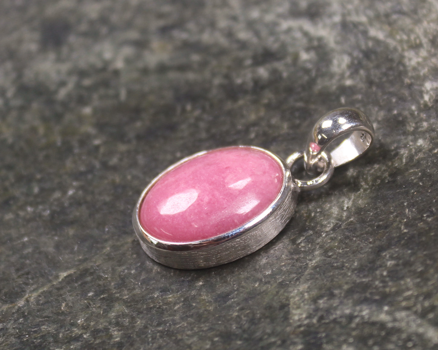 Sterling Silver Pendant carved from Rhodonite