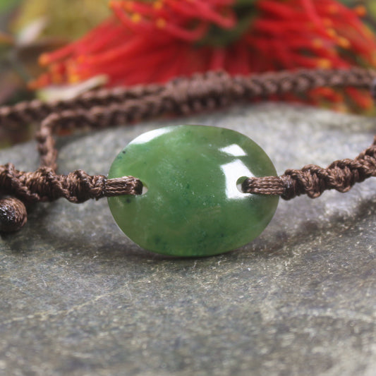 Adjustable cord bracelet with Kawakawa Pounamu