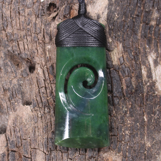 Toki with Koru pendant