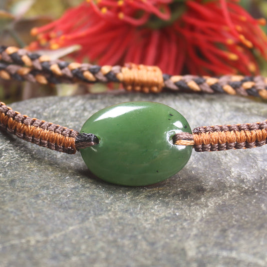 Adjustable cord bracelet with Kawakawa Pounamu