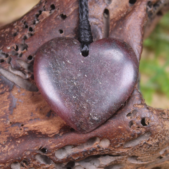 Heart carved from Rhodonite 