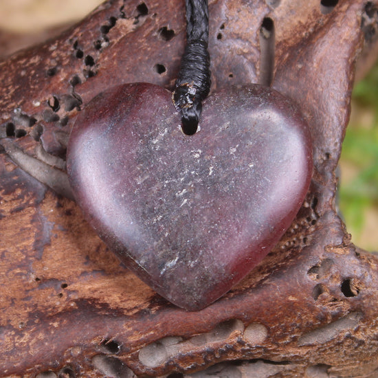 Heart carved from Rhodonite 