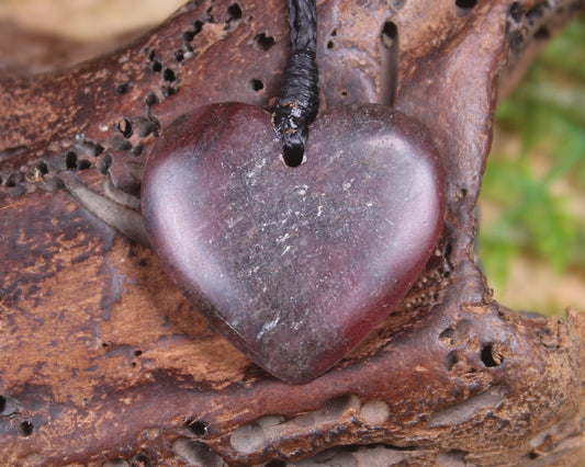 Heart carved from Rhodonite 