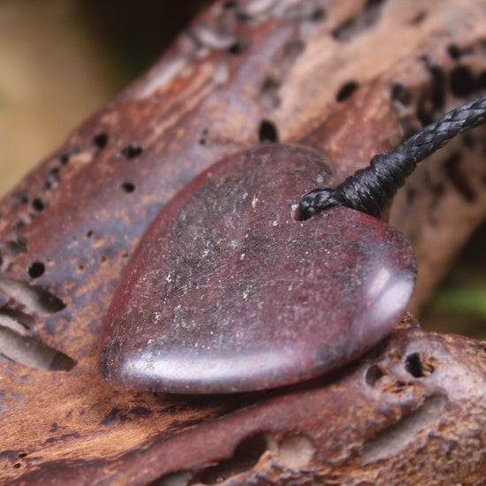 Heart carved from Rhodonite 