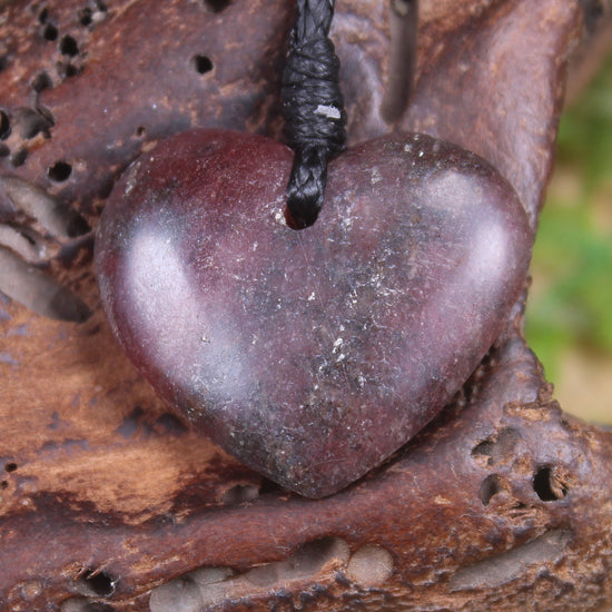 Heart carved from Rhodonite 
