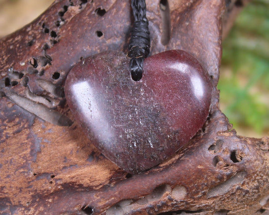 Heart carved from Rhodonite 