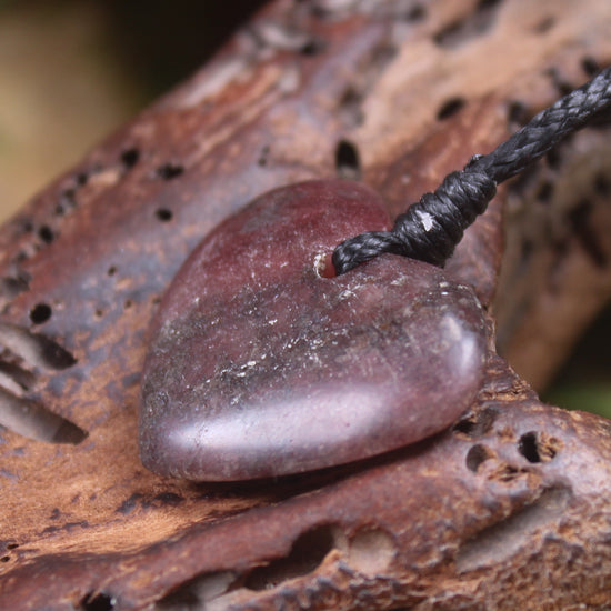 Heart carved from Rhodonite 