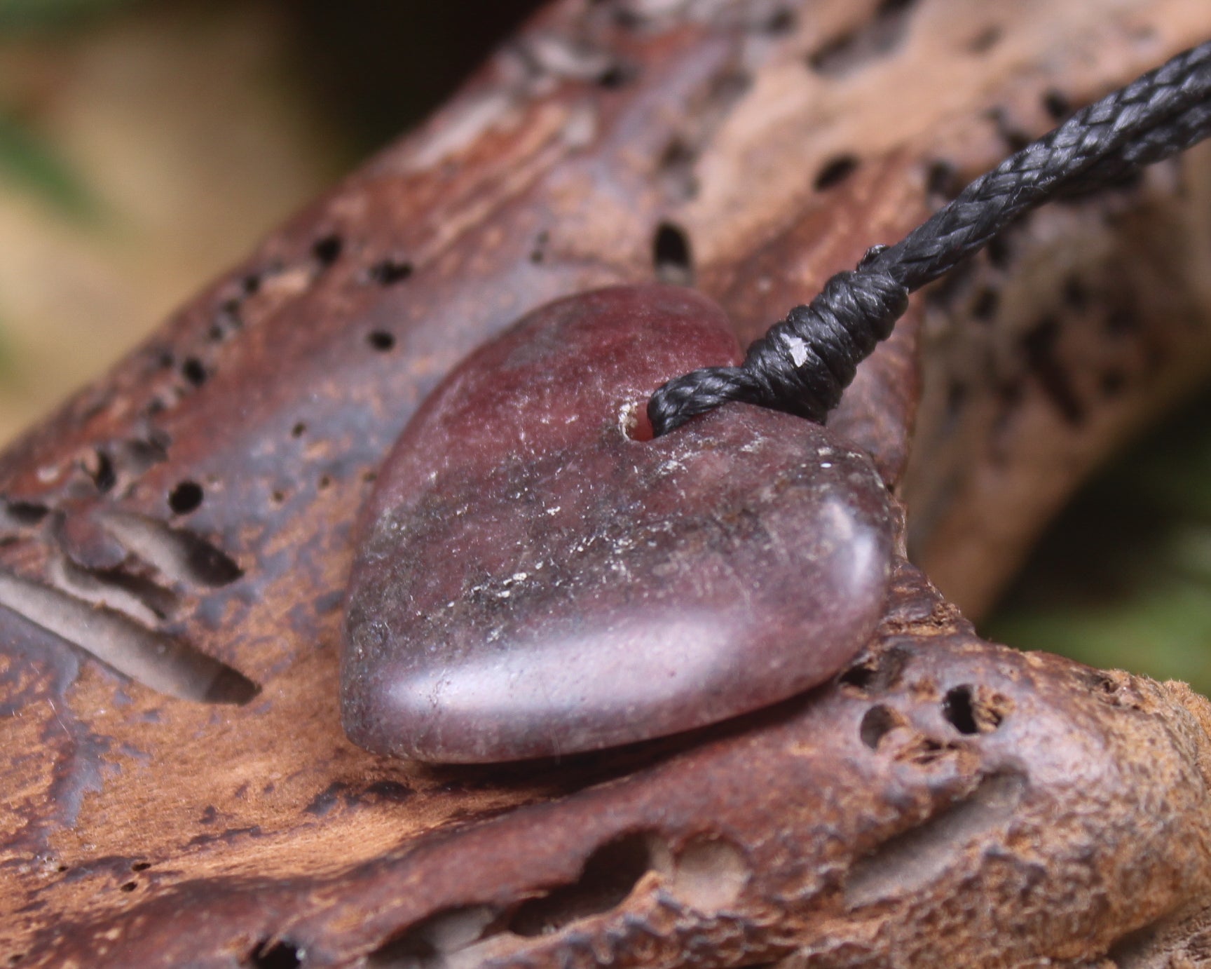 Heart carved from Rhodonite 