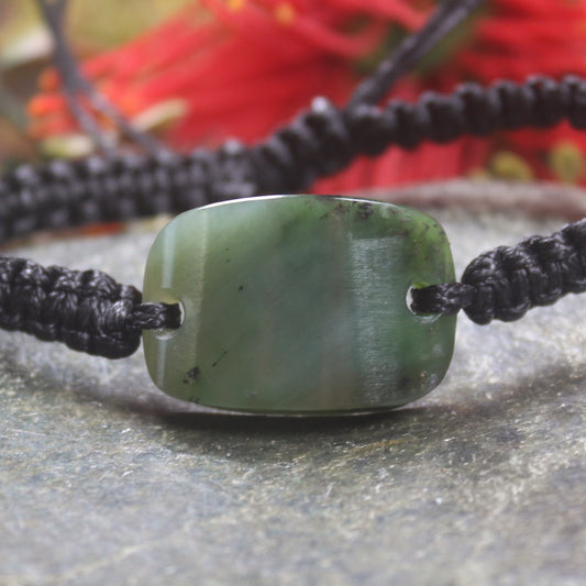 Adjustable cord bracelet with Hapopo Pounamu