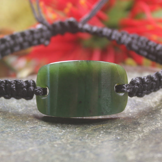 Adjustable cord bracelet with Kawakawa Pounamu