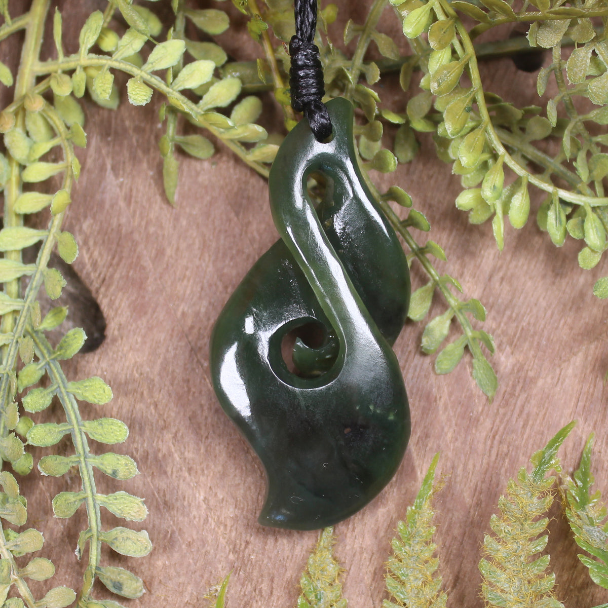Koru Twist carved from Kawakawa Pounamu - NZ Greenstone