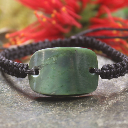 Adjustable cord bracelet with Kawakawa Pounamu