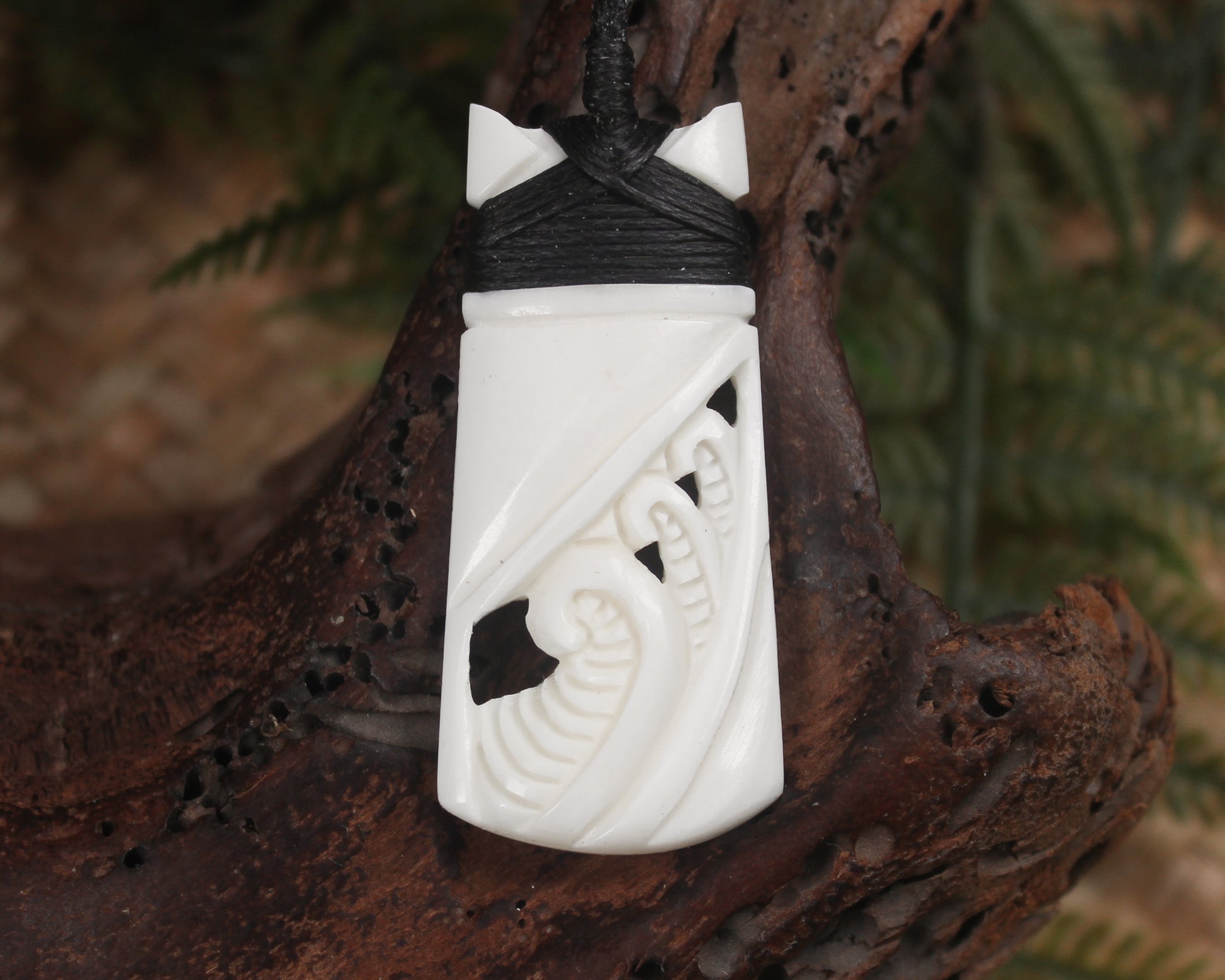 Toki or Adze with Koru carved from Beef Bone