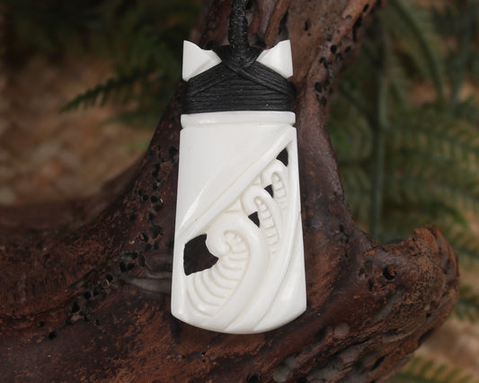 Toki or Adze with Koru carved from Beef Bone