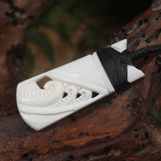 Toki or Adze with Koru carved from Beef Bone