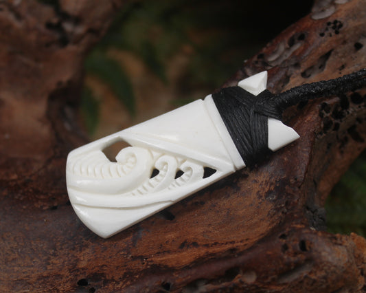 Toki or Adze with Koru carved from Beef Bone