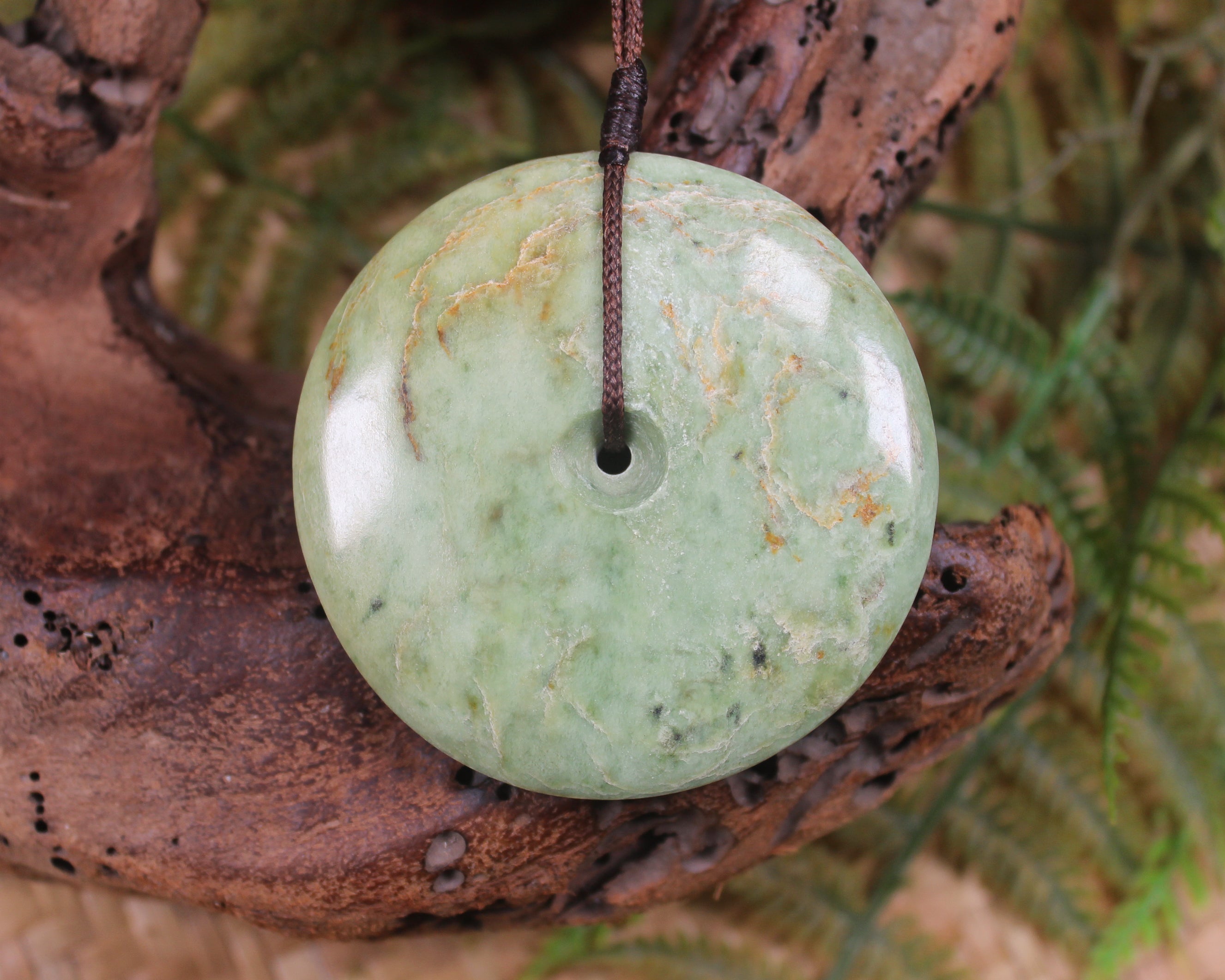 Porowhita carved from Flower Jade Pounamu - NZ Greenstone