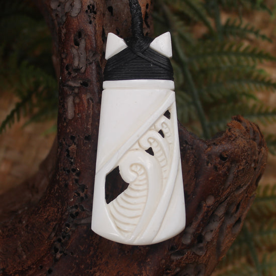 Toki or Adze with Koru carved from Beef Bone