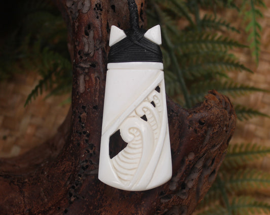 Toki or Adze with Koru carved from Beef Bone