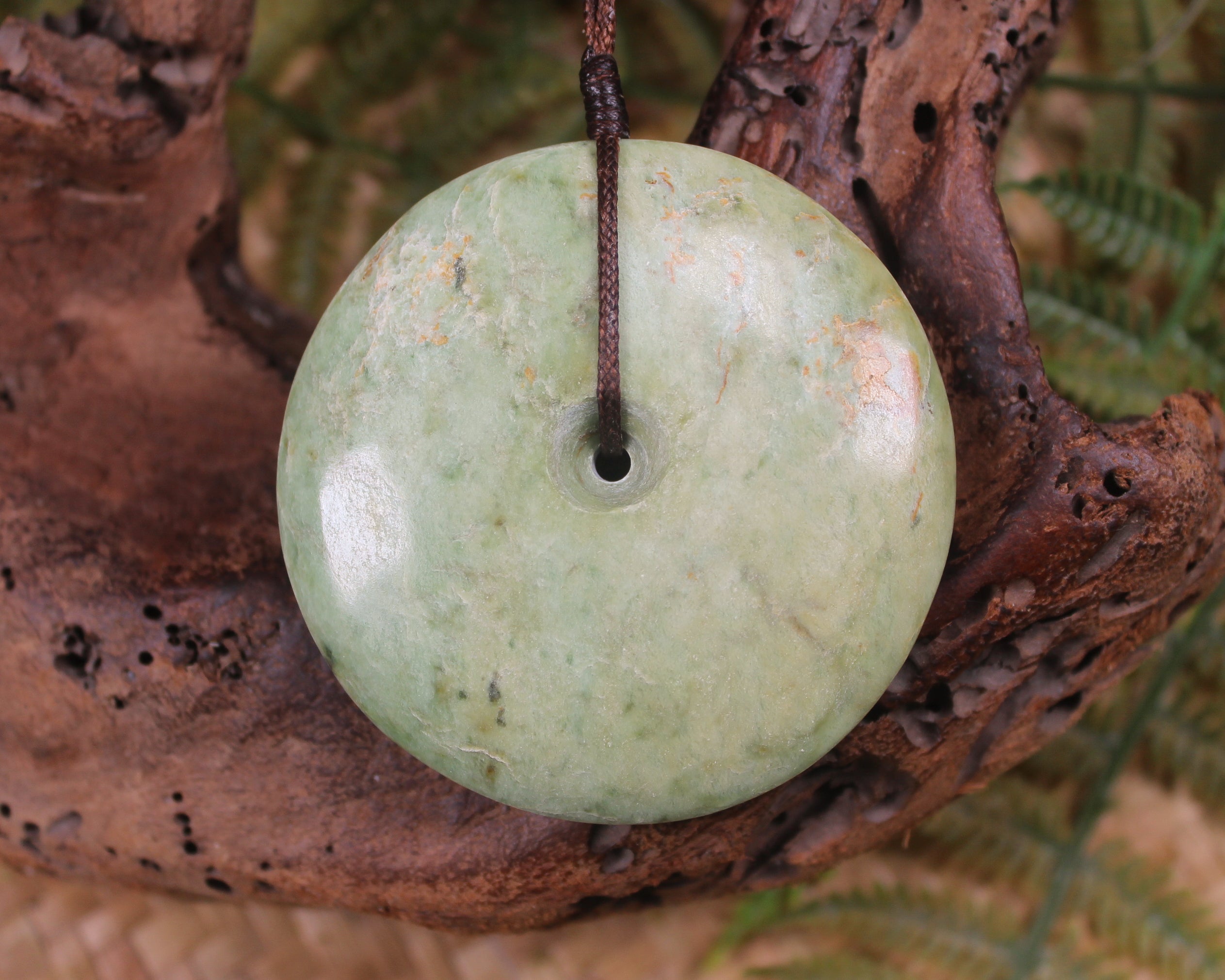 Porowhita carved from Flower Jade Pounamu - NZ Greenstone