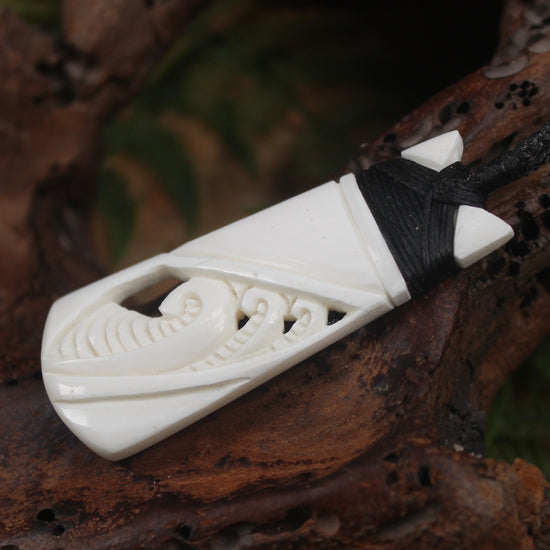 Toki or Adze with Koru carved from Beef Bone