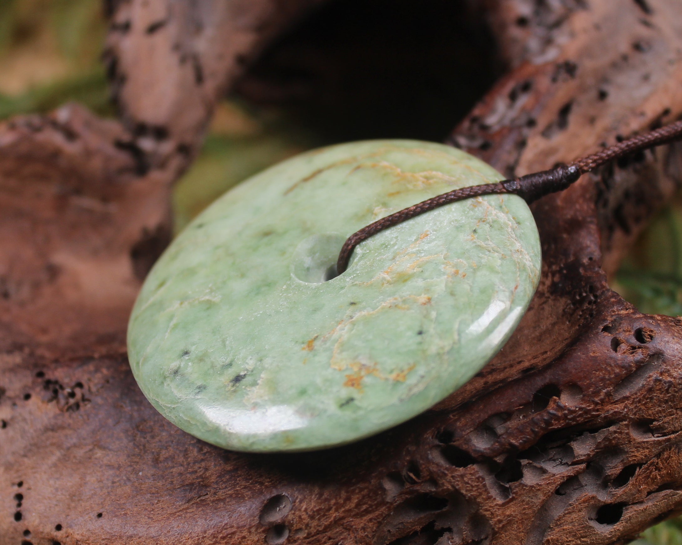 Porowhita carved from Flower Jade Pounamu - NZ Greenstone