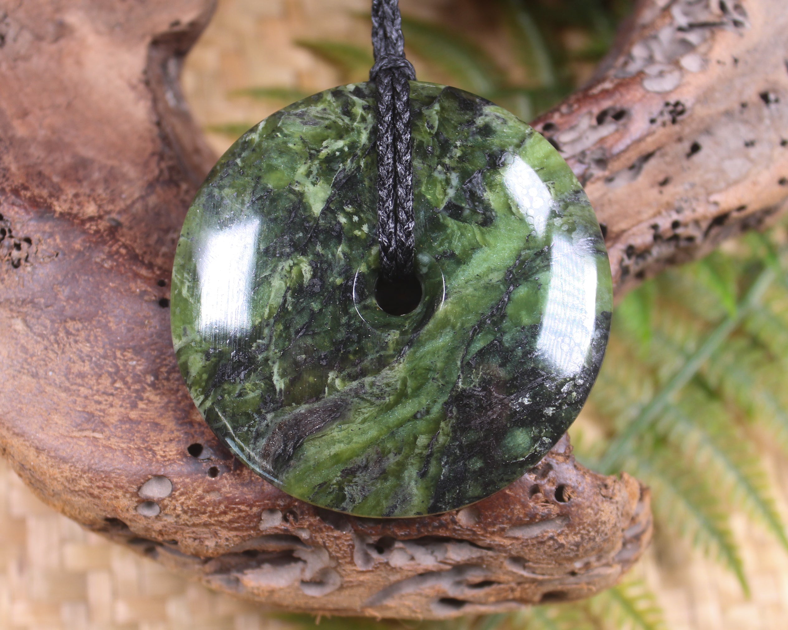 Porowhita carved from Douglas Creek Pounamu - NZ Greenstone