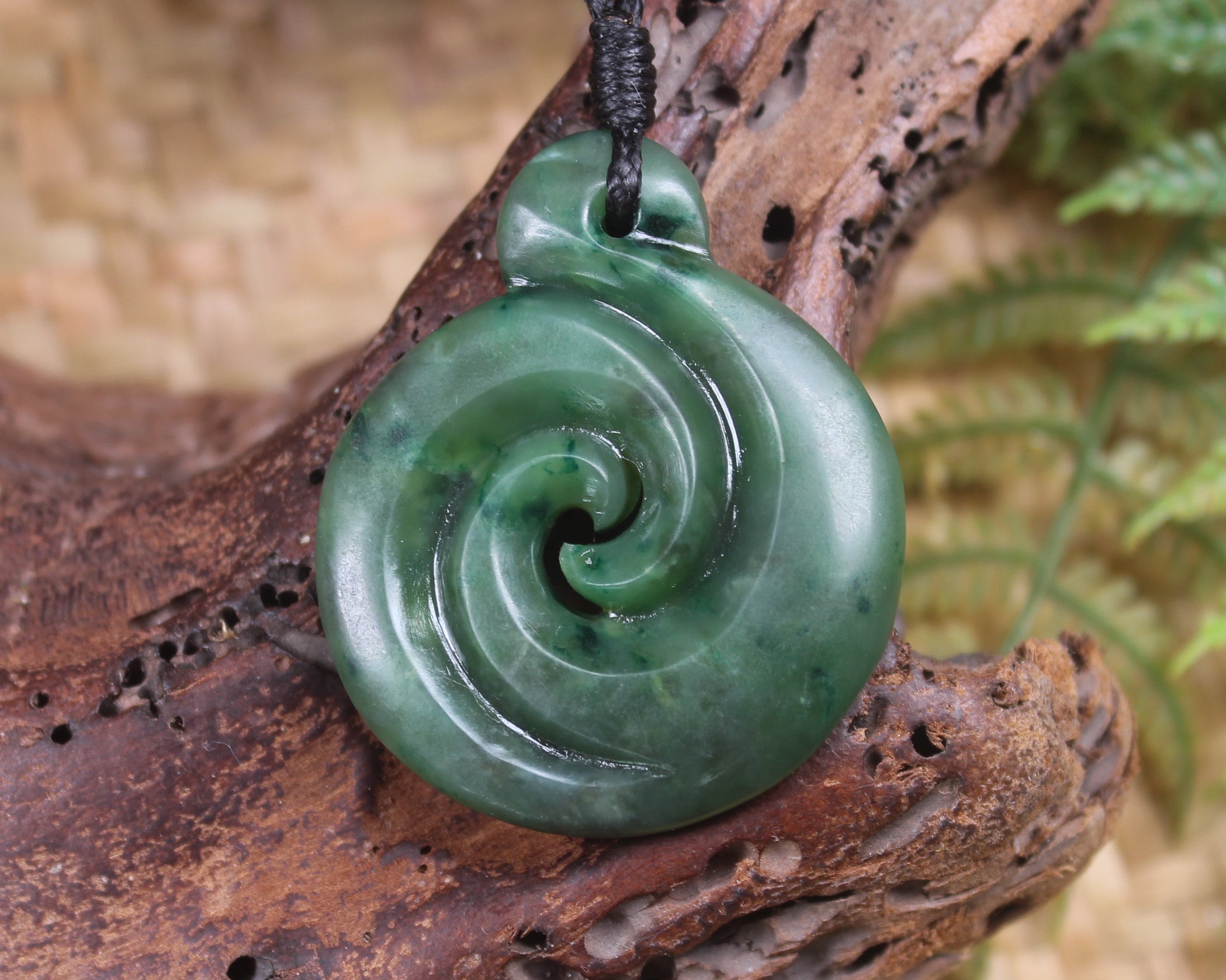 Koru pendant carved from Kawakawa Pounamu - NZ Greenstone