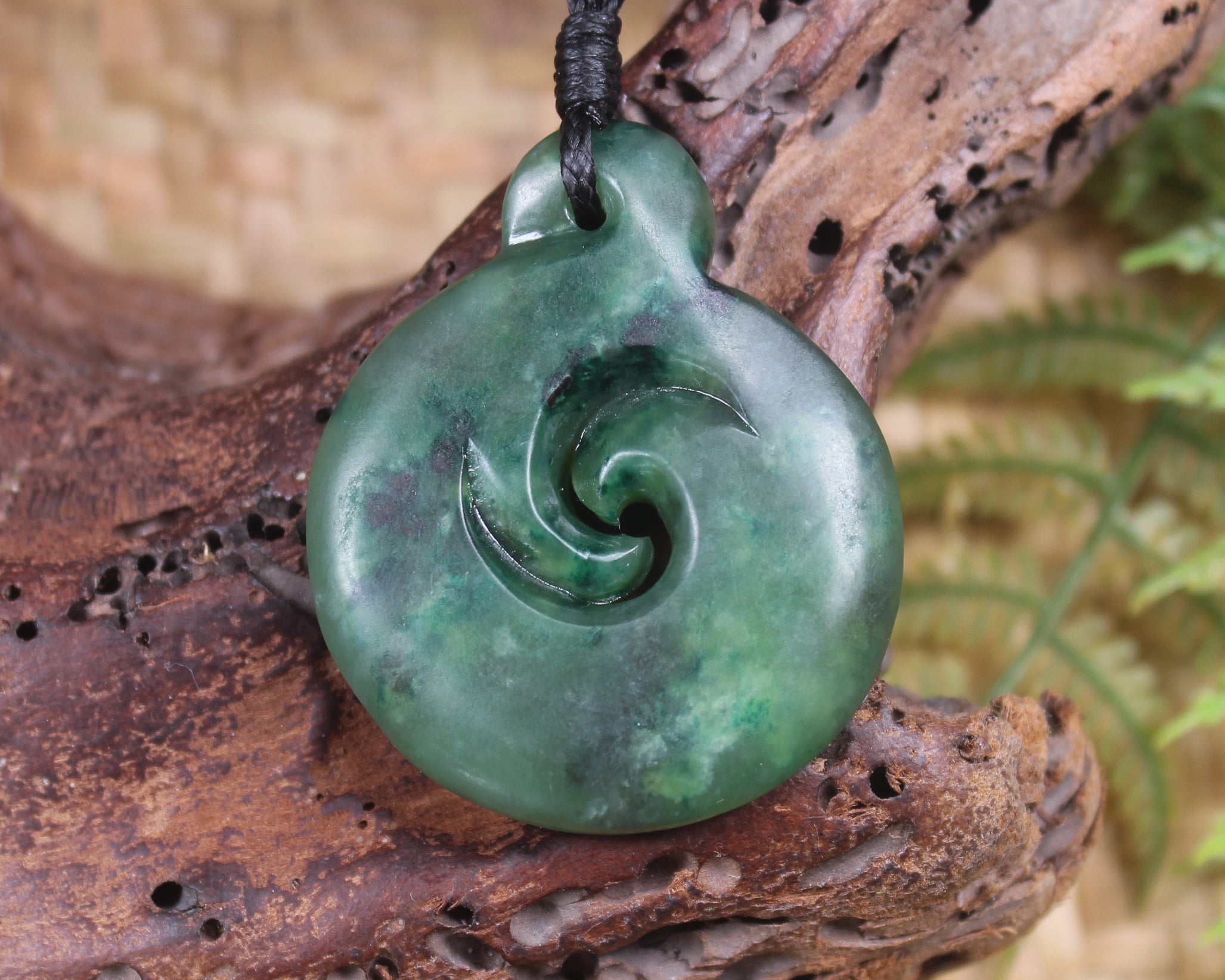 Koru pendant carved from Kawakawa Pounamu - NZ Greenstone