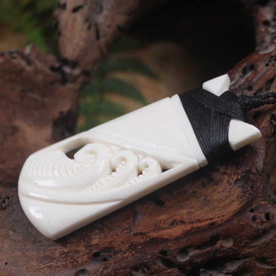 Toki or Adze with Koru carved from Beef Bone