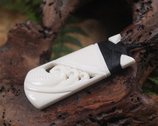 Toki or Adze with Koru carved from Beef Bone