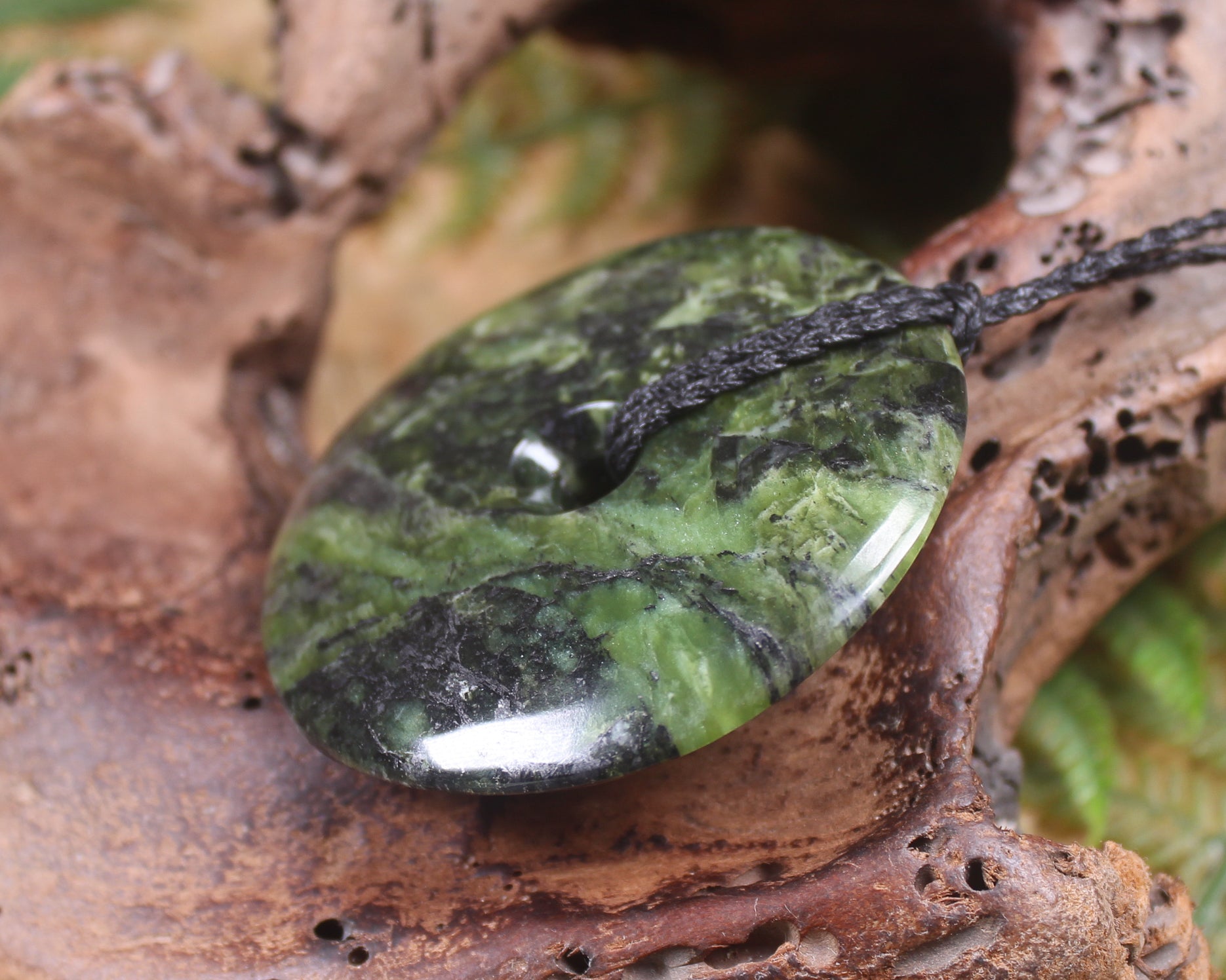 Porowhita carved from Douglas Creek Pounamu - NZ Greenstone