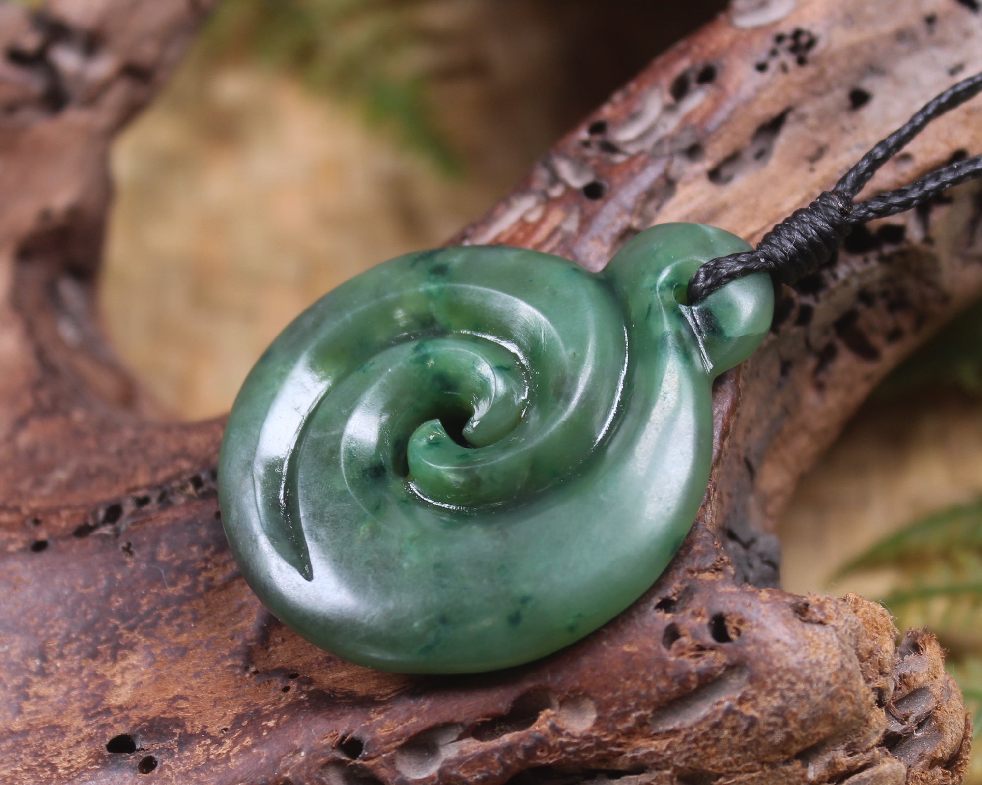 Koru pendant carved from Kawakawa Pounamu - NZ Greenstone