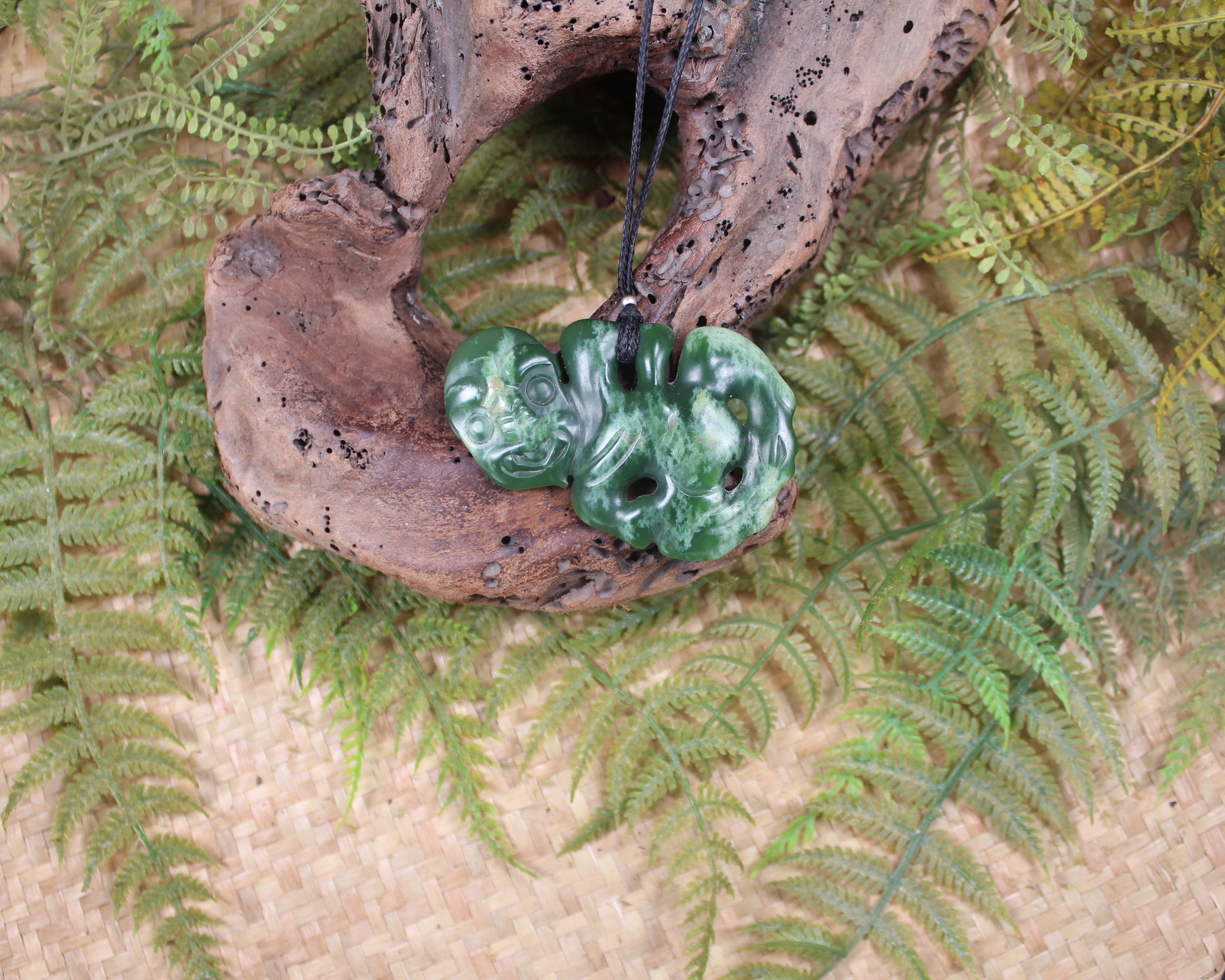 Hei Tiki carved from Flower Jade Pounamu - NZ Greenstone