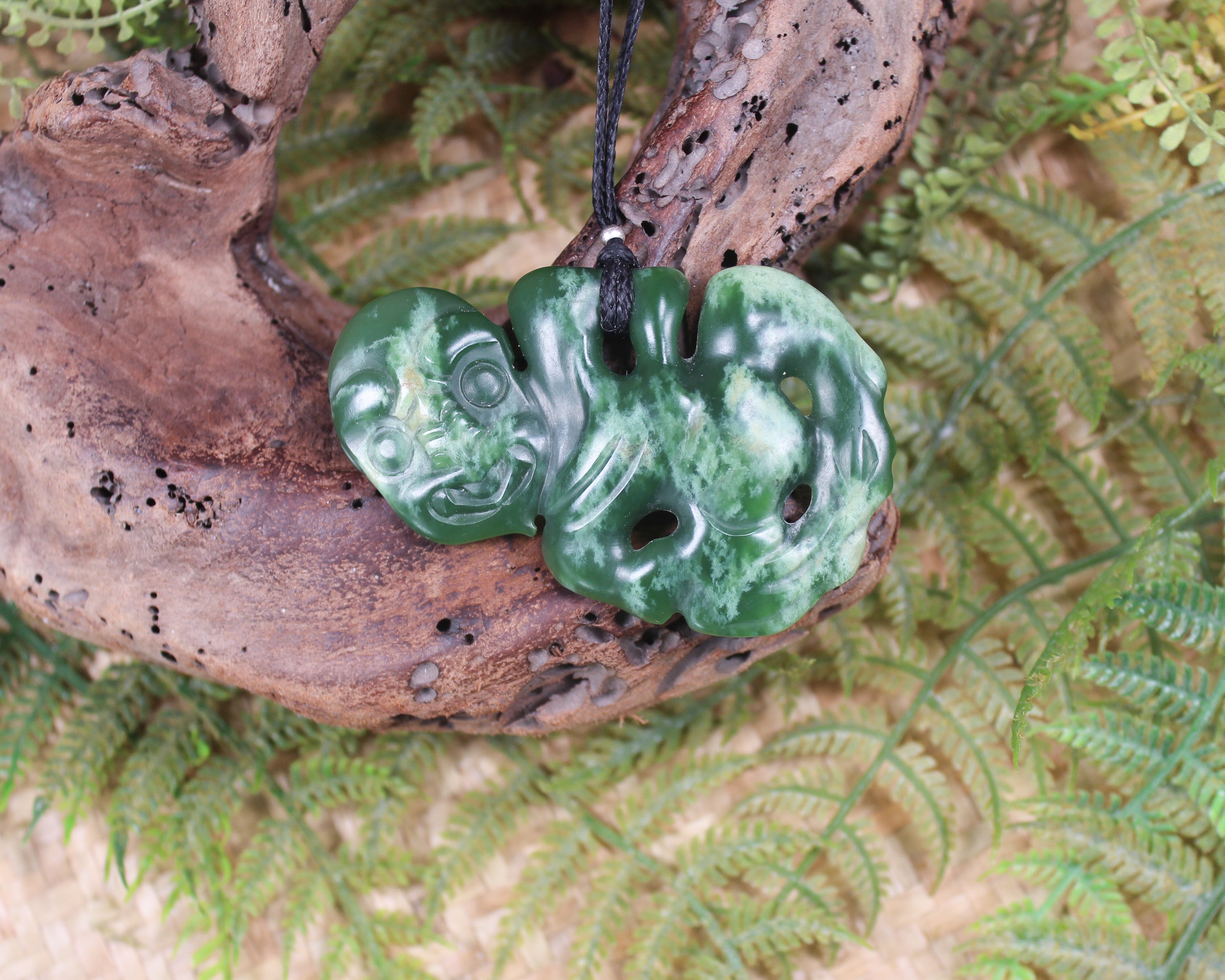 Hei Tiki carved from Flower Jade Pounamu - NZ Greenstone