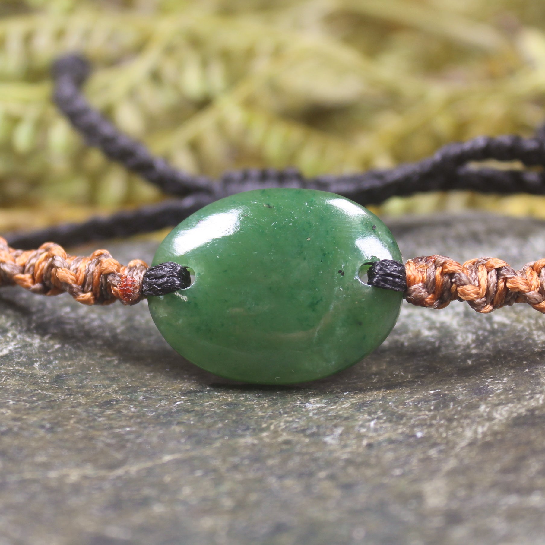 Adjustable cord bracelet with Hapopo Pounamu