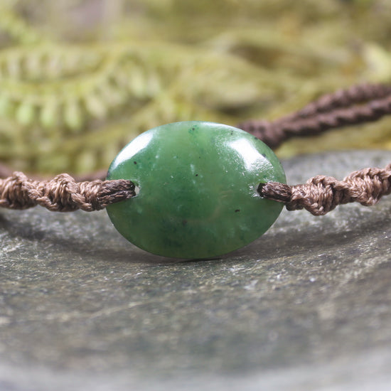 Adjustable cord bracelet with Hapopo Pounamu