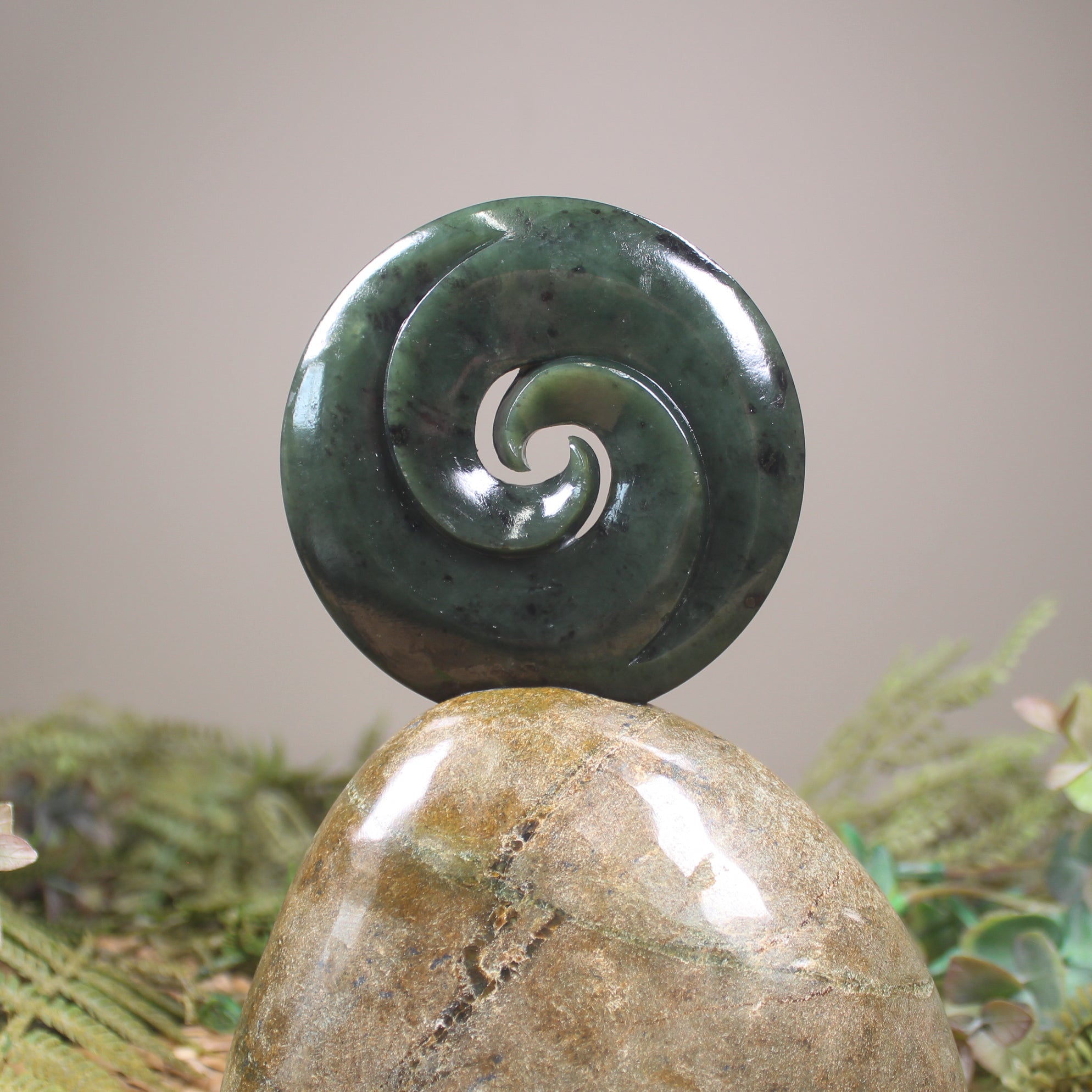 Koru sculpture carved from Rimu Pounamu - NZ Greenstone